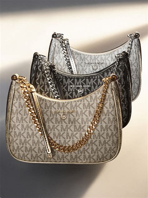 sac a main michael kors jet set charm item|Jet Set Charm Small Logo Pochette .